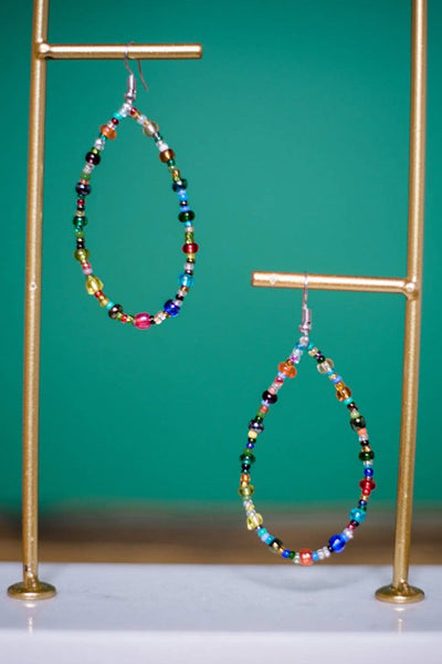 Get trendy with Rainbow Beaded Hoops Earring - Earrings available at ShopMucho. Grab yours for $12 today!