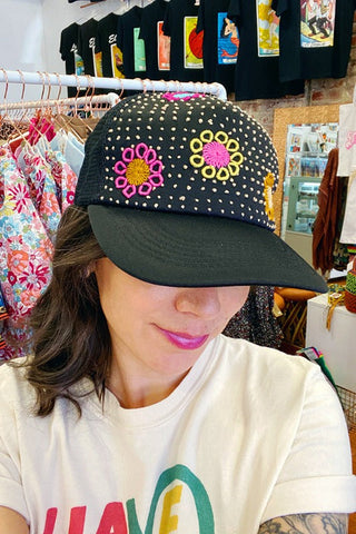 Get trendy with Tulum Hand Embroidered Trucker Flower Hat - Hats available at ShopMucho. Grab yours for $60 today!
