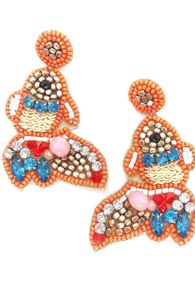 Get trendy with Hand Beaded Fish Dangle Earrings - Earrings available at ShopMucho. Grab yours for $39 today!