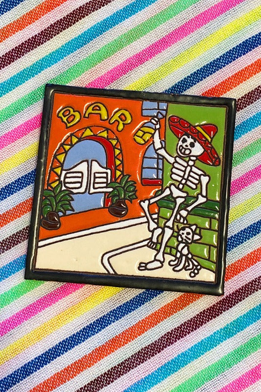 Get trendy with Skeleton At The Bar Ceramic Tile - Decor available at ShopMucho. Grab yours for $10 today!